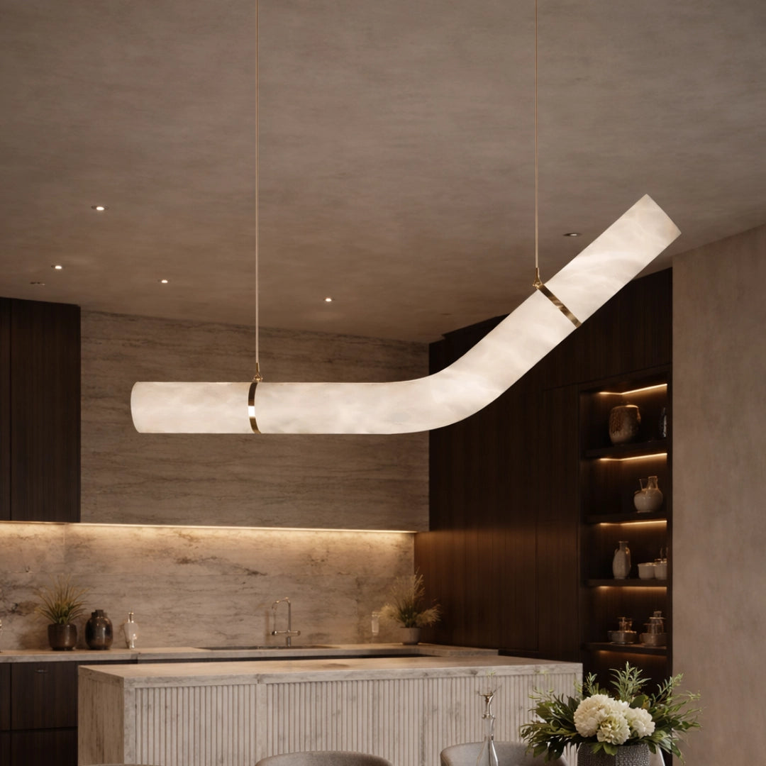 V-Curve alabaster pendant light above a modern kitchen island