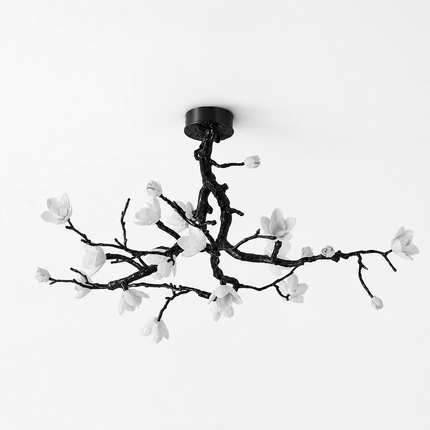 Arborielle copper branch ceiling light with black finish and white ceramic flowers on a white background