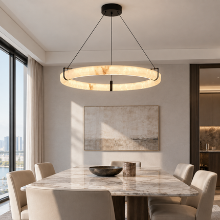 Anulora alabaster ring chandelier above a rectangular light dining table