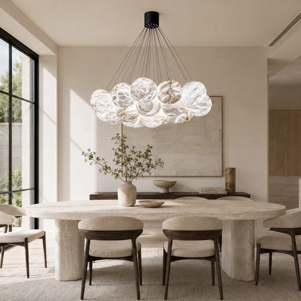 Avelune Bubble Alabaster Chandelier installed above a rectangular dining table