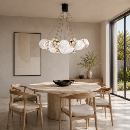 Avelune alabaster chandelier above a round dining table