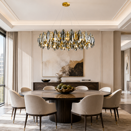 Navette smoke gray crystal chandelier above a round table in a contemporary dining room