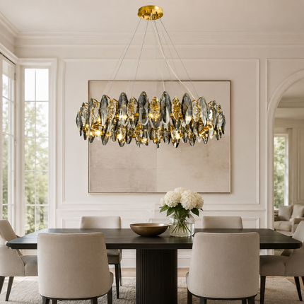 Navette smoke gray crystal chandelier above a rectangular dining table in a bright interior