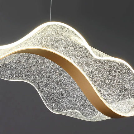 Close-up of clear textured acrylic waves on the Tidal Ribbon Chandelier