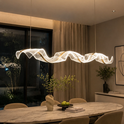 Acrylic linear LED chandelier lighting an evening dining area
