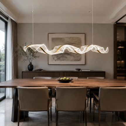Tidal Ribbon Chandelier above a long wood dining table