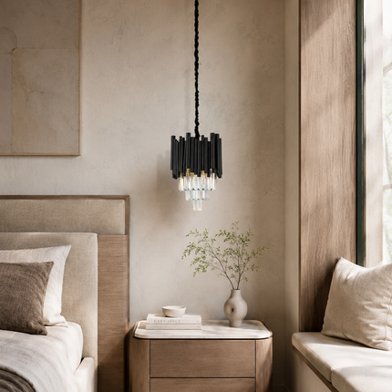 Virelle black metal crystal pendant light above a wood bedside table in a neutral bedroom