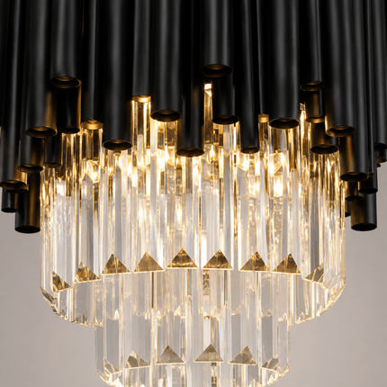 Close-up of Virelle pendant light with black metal tubes and tiered clear crystal rods