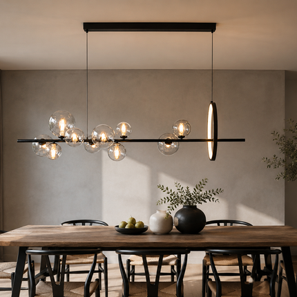Illuminated Virelune bubble chandelier above a long dining table